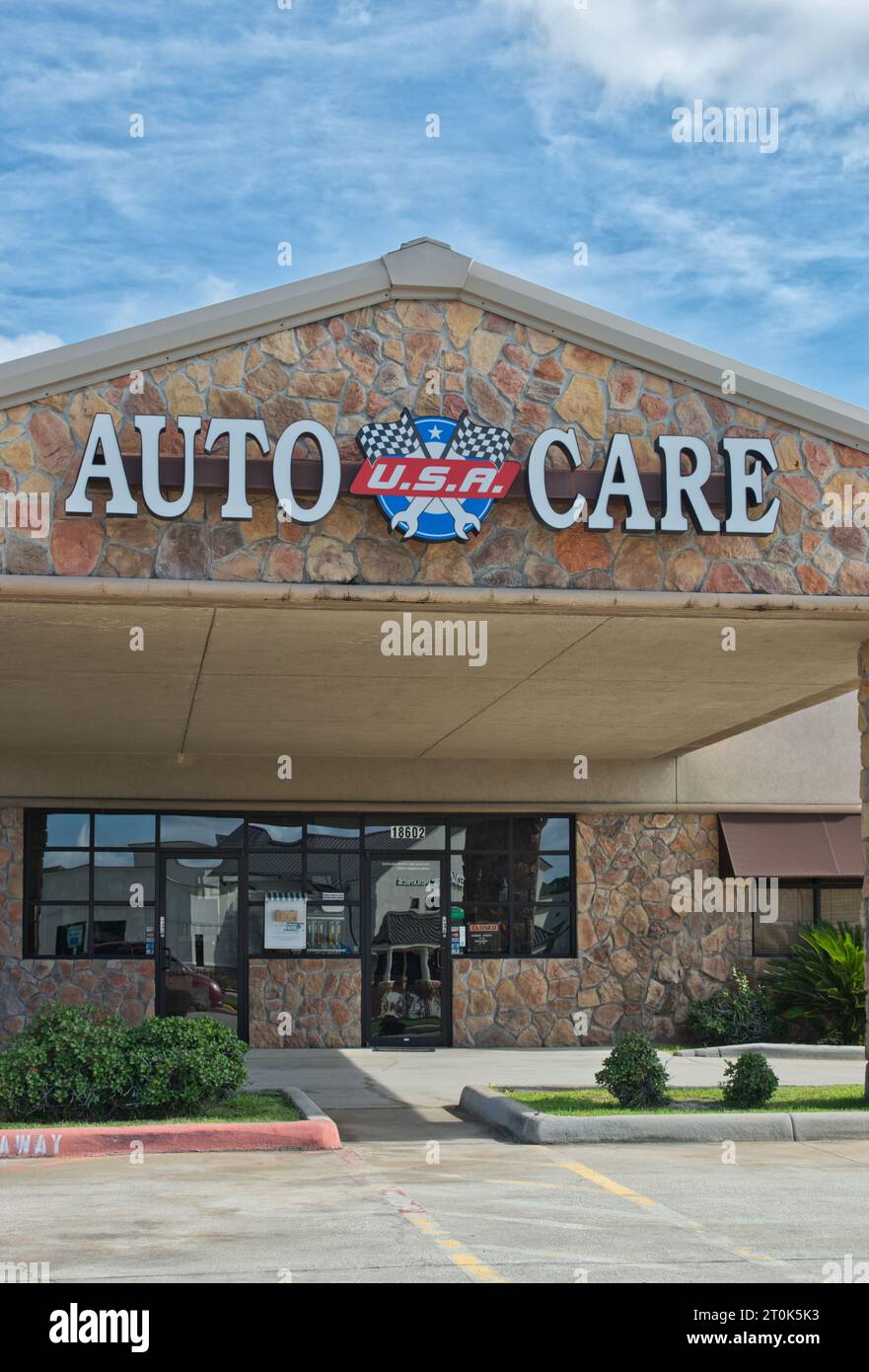 Houston, Texas USA 09-24-2023: Auto Care USA building storefront exterior in Houston, TX. Local automotive repair shop business. Stock Photo