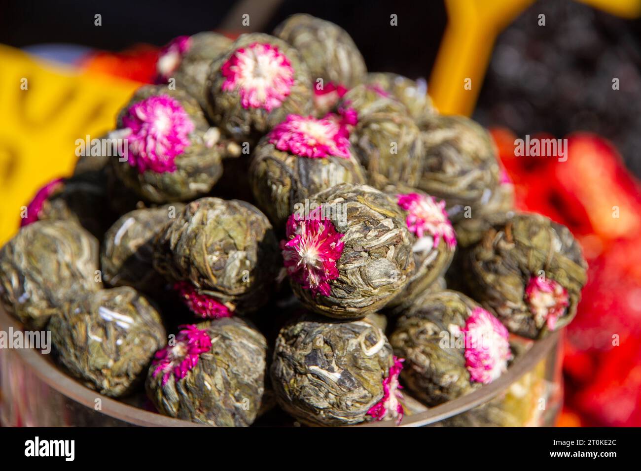 Dry jasmine blooming tea balls Stock Photo