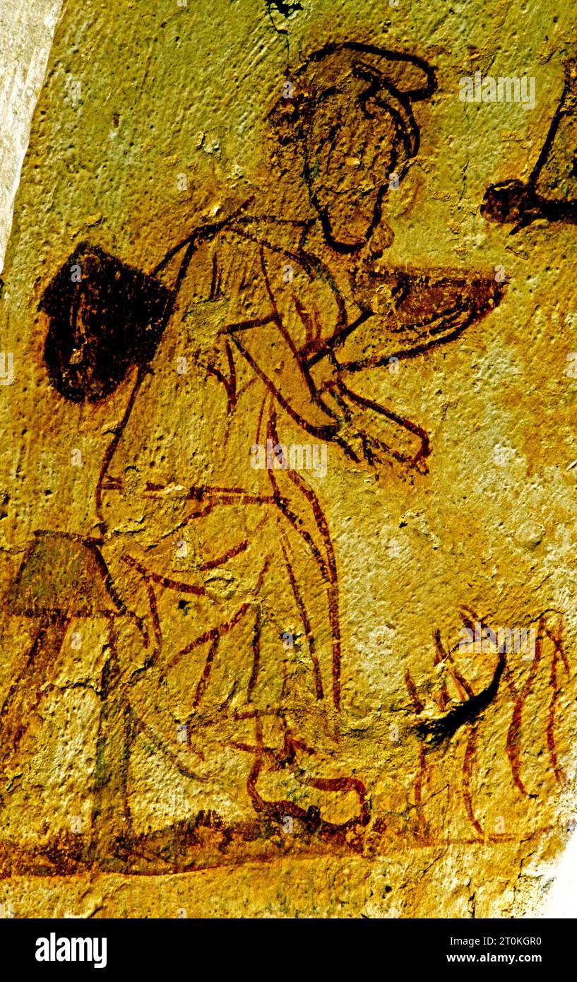 Longthorpe Tower, Peterborough, 14th century domestic wall painting,  Medieval, Labour of Month, January, man warming in front of fire Stock Photo