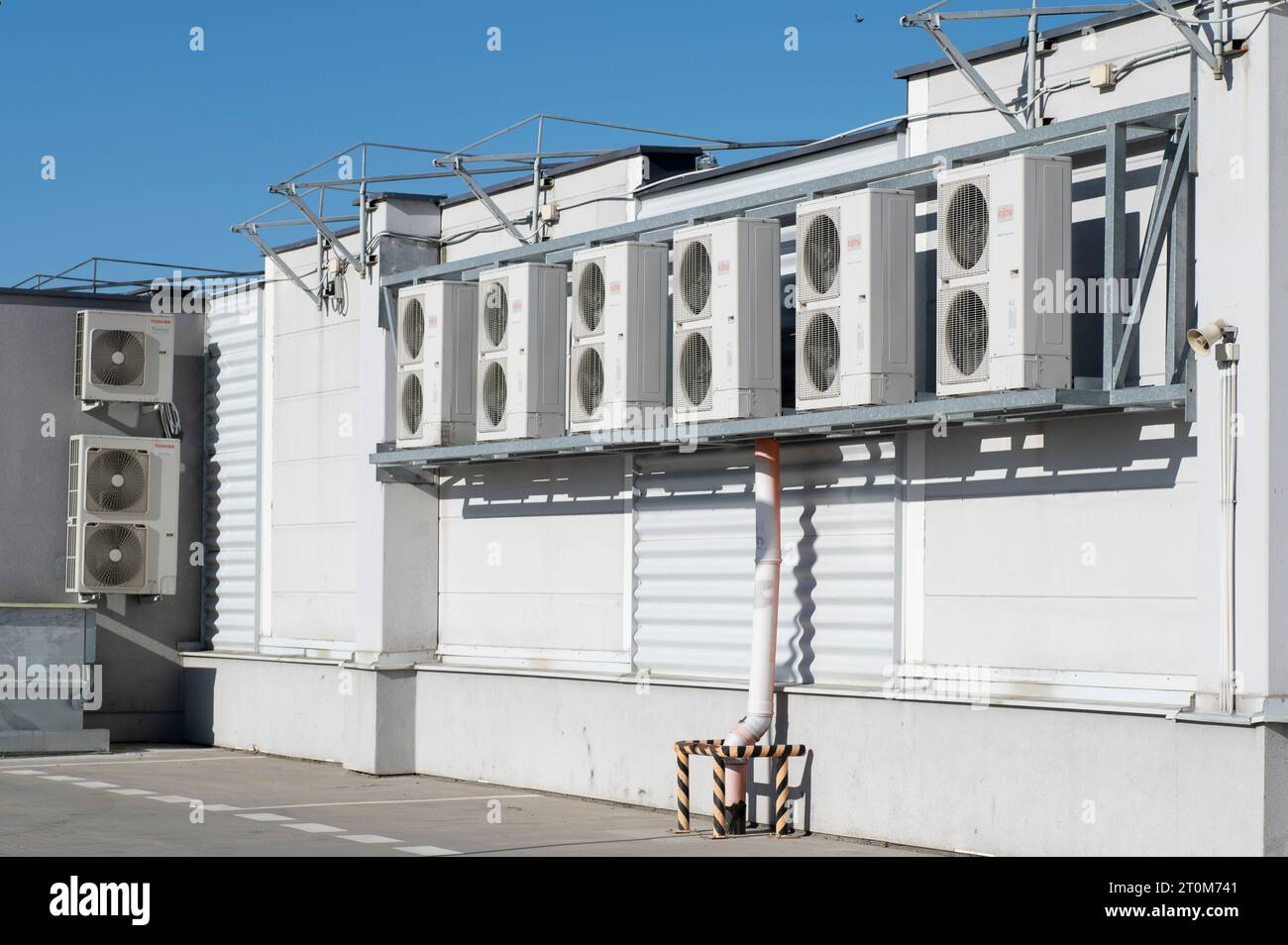 Nitra, Slovakia - October, 6, 2023 : Fujitsu and Toshiba inverters. External units of air conditioning system. Stock Photo