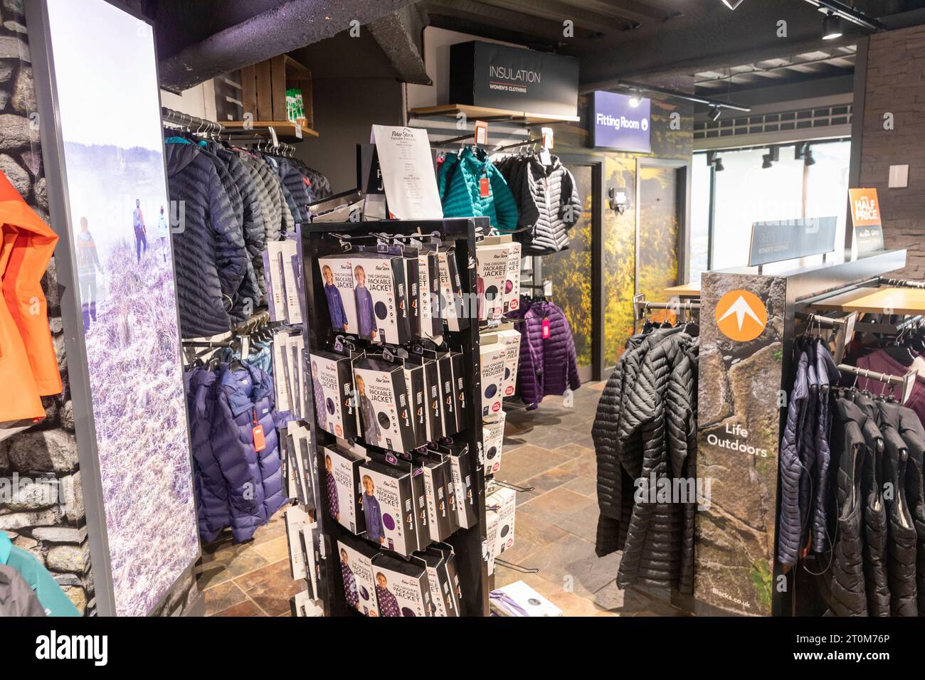 Blacks outdoor store in Ambleside, shop interior of clothing jackets and  trousers including some on sale, Ambleside,Lake District,England,UK Stock  Photo - Alamy