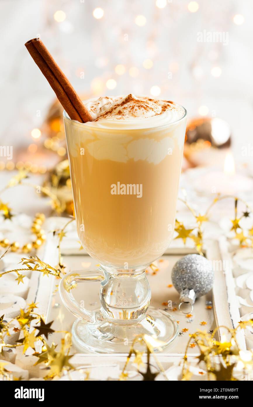 Egg Nog with Cinnamon Sticks Stock Photo Alamy