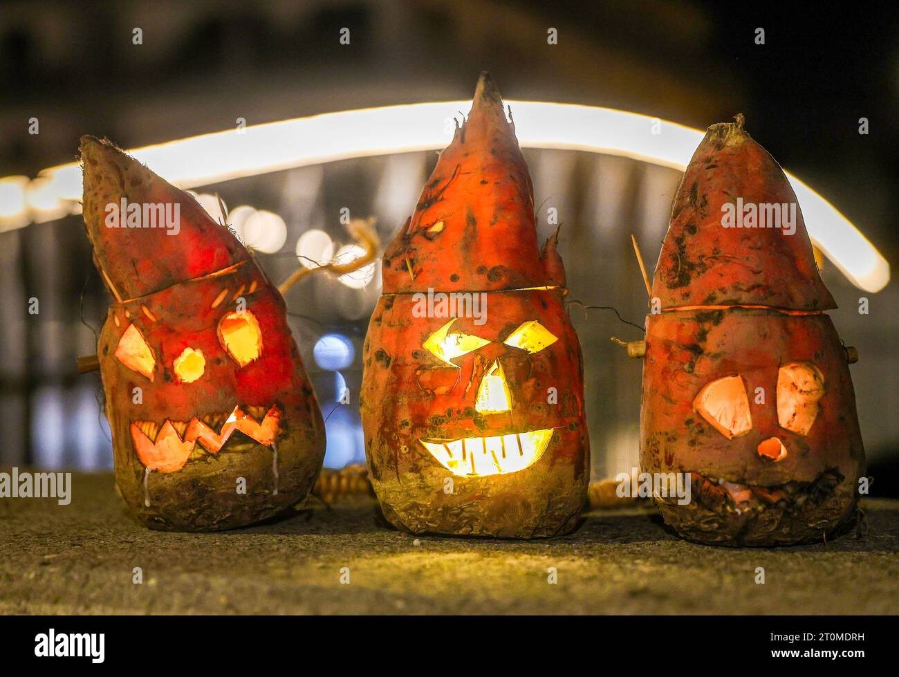 Riedlingen, Germany. 08th Oct, 2023. Illuminated turnip ghosts stand on
