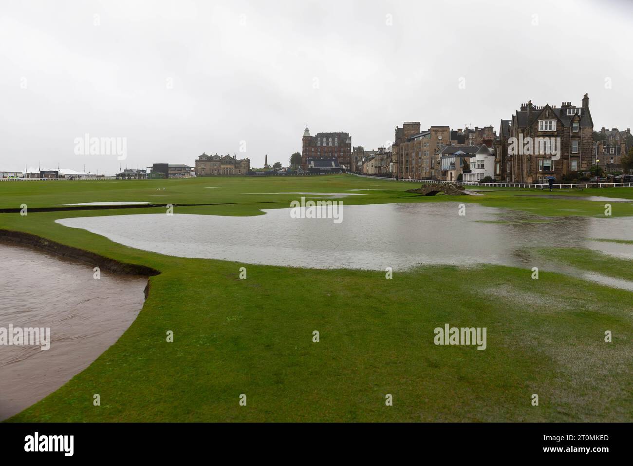 St Andrews, UK. 8th Oct, 2023. The Swilken Burn is almost overflowing onto a flooded Old Course as rain stops play on days 3 and 4 of the Alfred Dunhill Links Championship 2023. Credit: Tim Gray/Alamy Live News Stock Photo