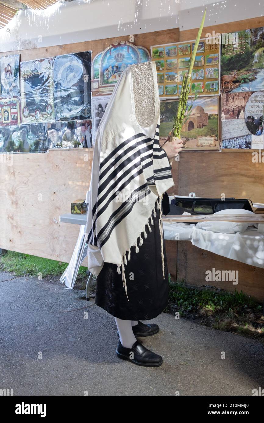 And unidentified orthodox Jewish man wearing high white socks and a