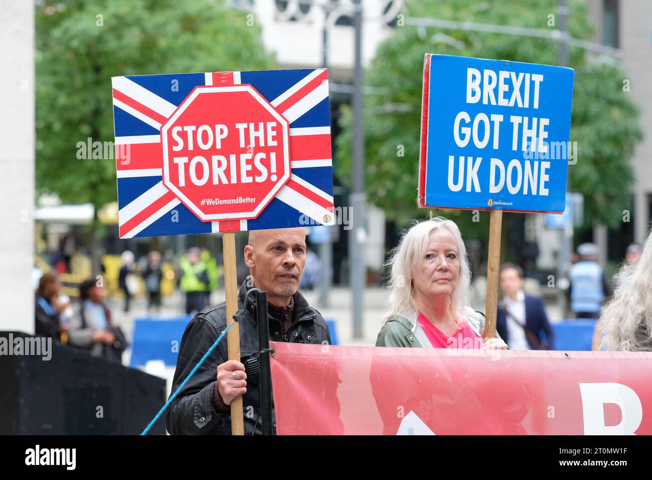 Manchester October 2023 protesters outside the Conservative Party Conference with Stop The Tories placard sign Stock Photo