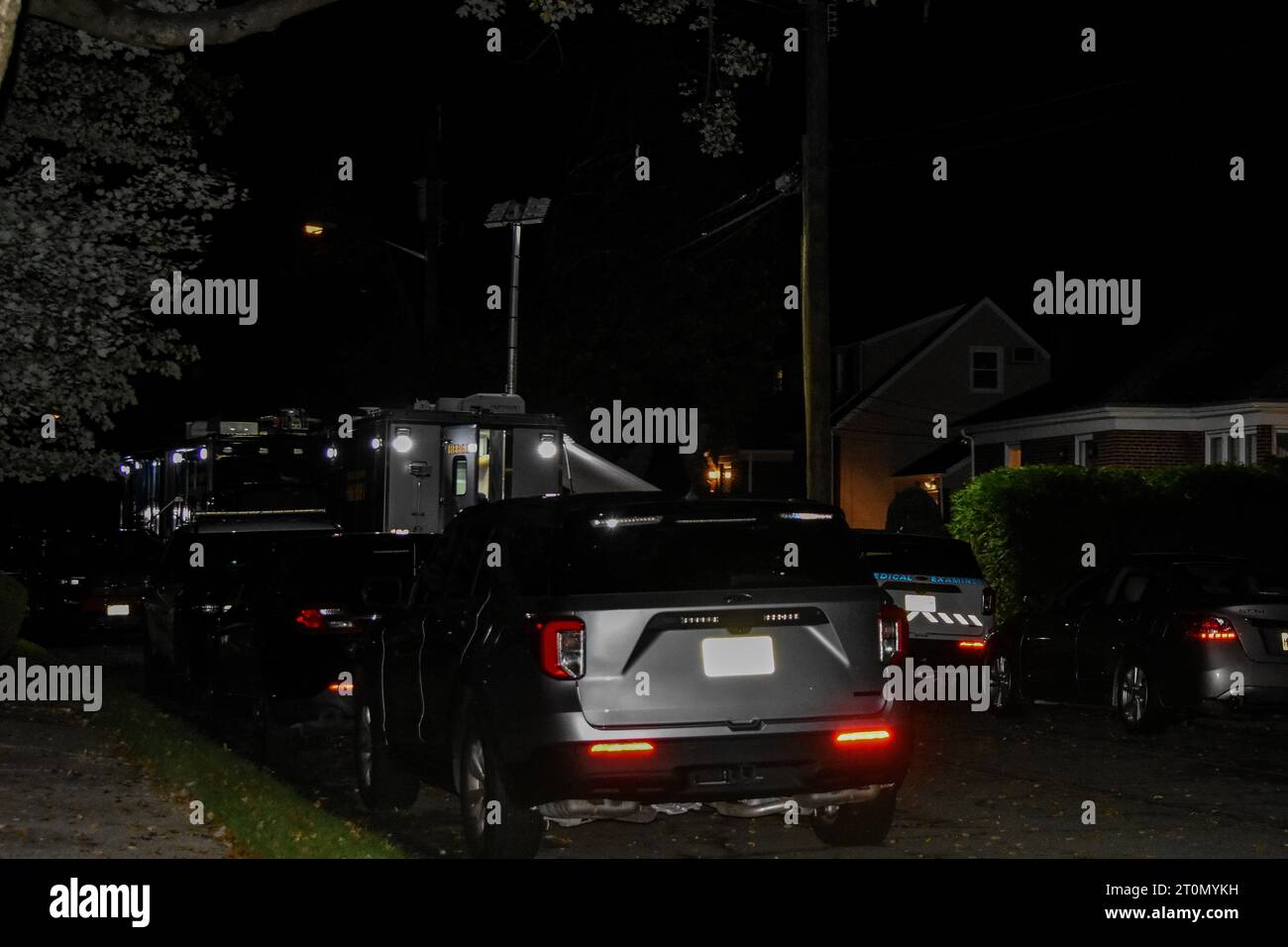 Authorities secure the scene and investigate the incident. Two people