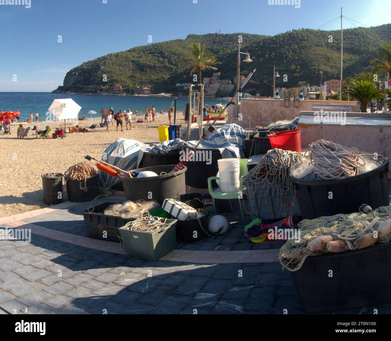 Display of fishing gear by beach in Noli, Savona, Liguria Stock Photo
