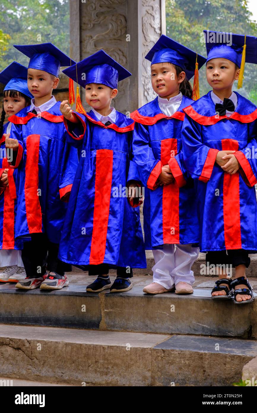 Hanoi, Vietnam. Temple of Literature, Van Mieu. Students Lining up for a Graduation Photo. Stock Photo