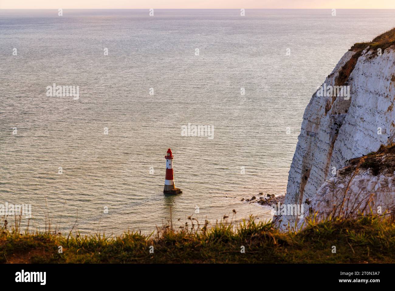 Beachy Head Lighthouse, a rock tower style lighthouse located in the English Channel below the cliffs of Beachy Head in East Sussex, southern England Stock Photo