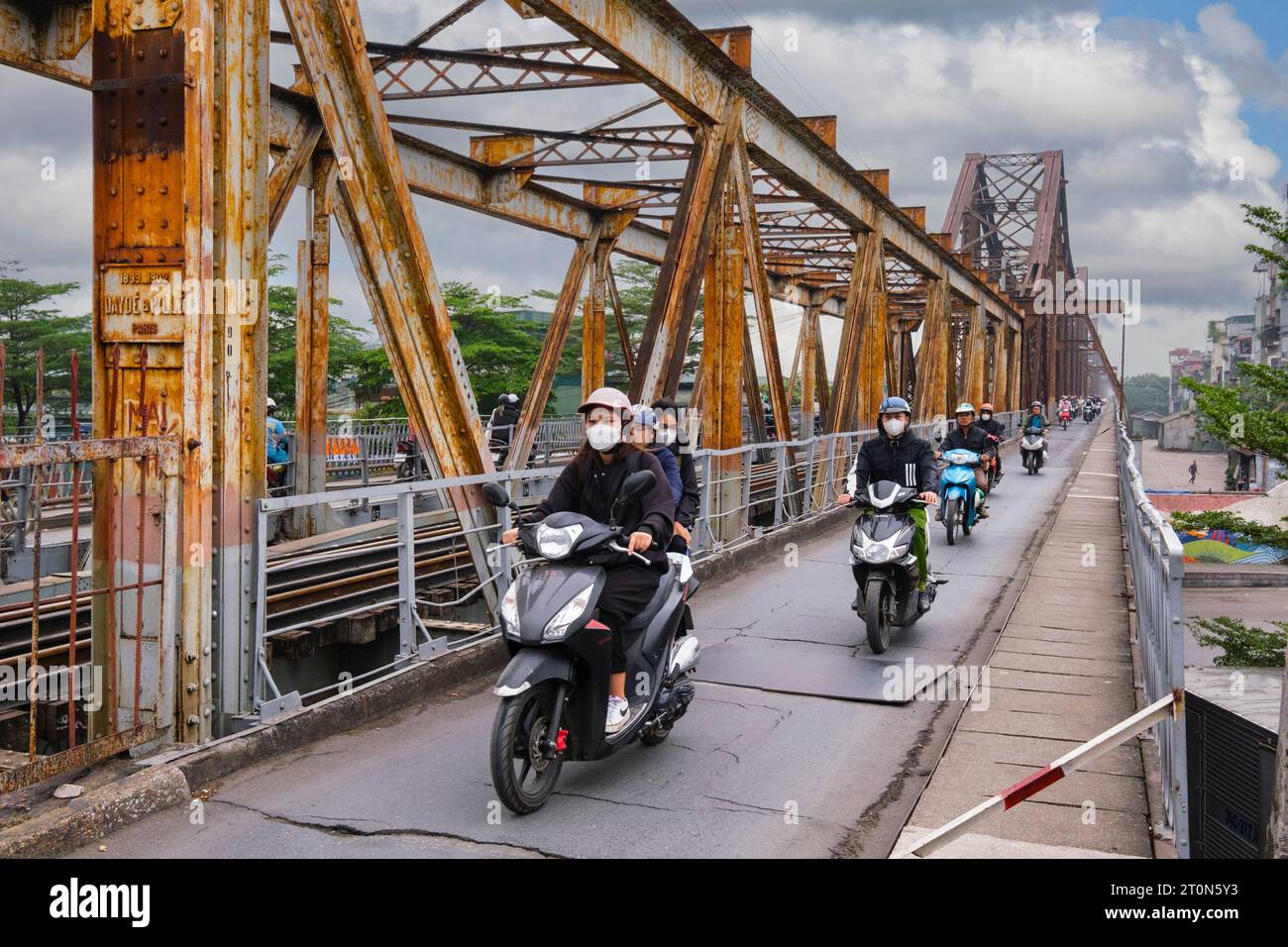 Hanoi, Vietnam. Long Bien Bridge Motorbike Traffic. Stock Photo