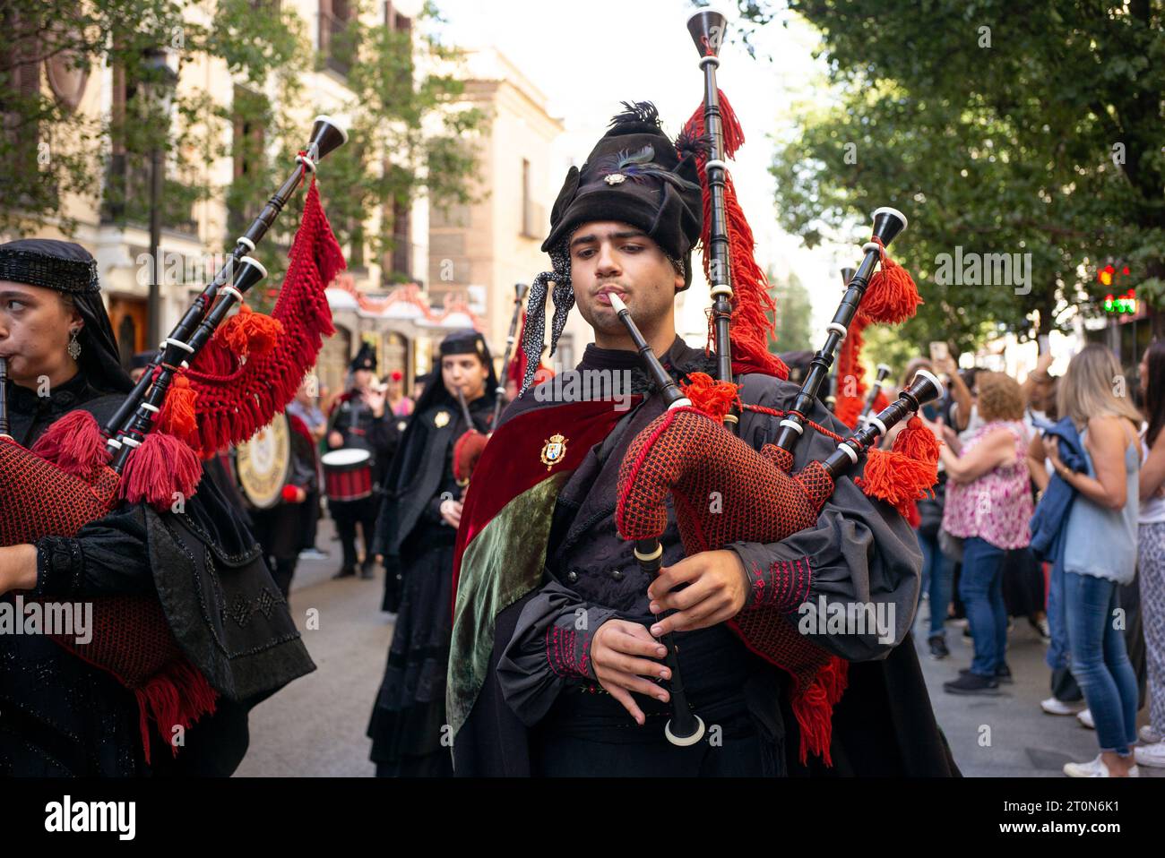 Musicians from the Real Banda de Gaitas perform during the HISPANIDAD 2023 festival at Puerta