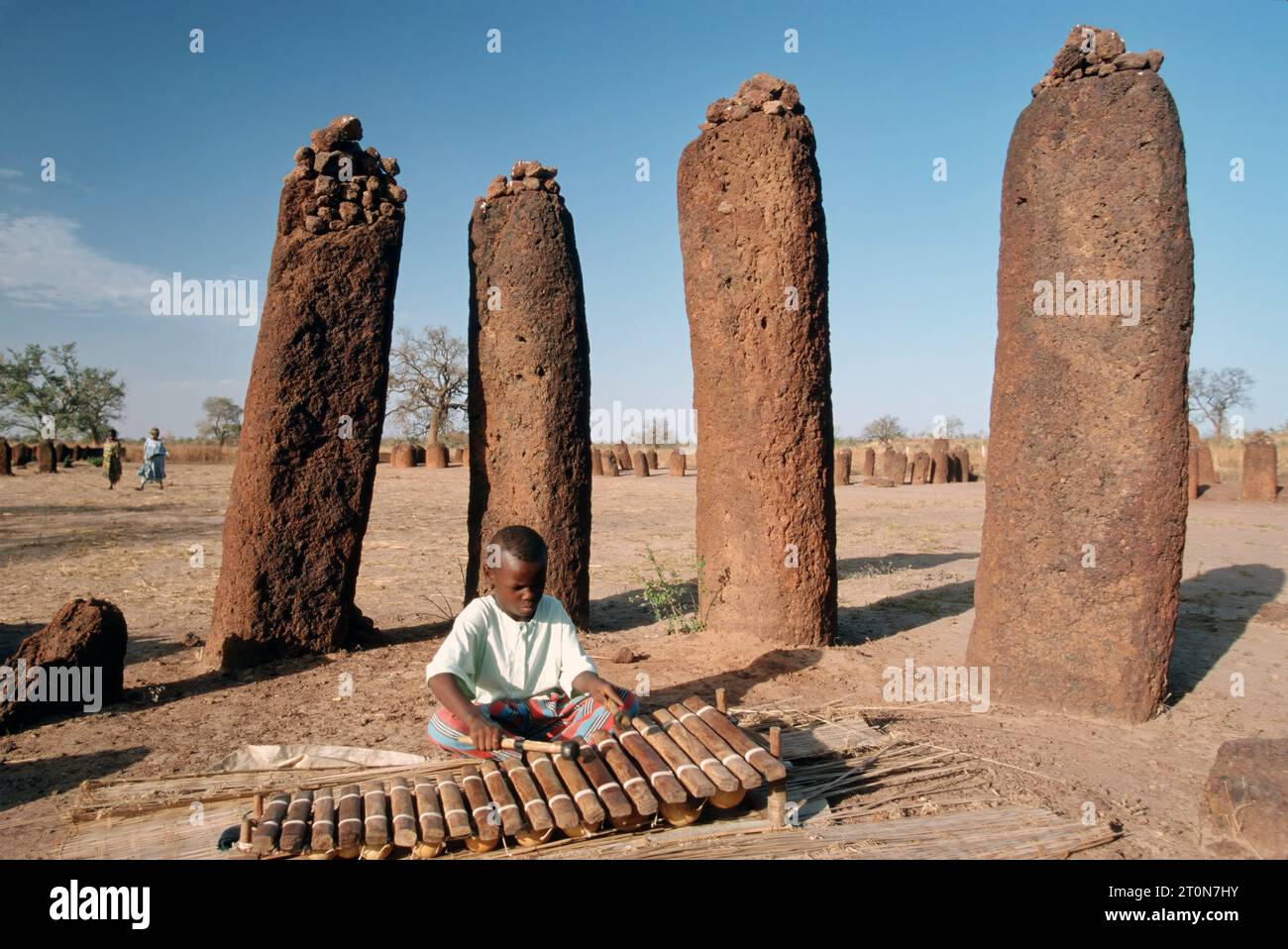 Gambia, GMB, a Boy plays Balaphon at the Wassu Stone Circles, UNESCO
