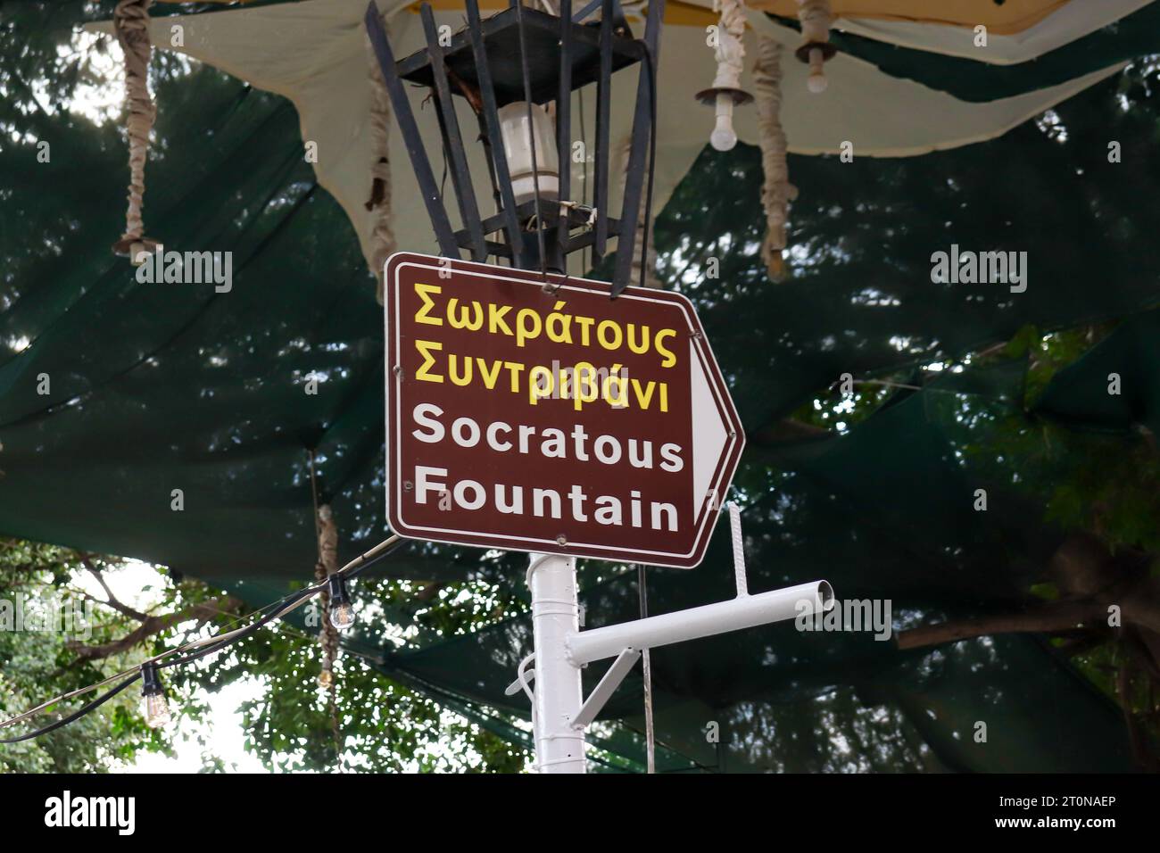 Directional sign to Socratous fountain (Castellania fountain) located at the prime location of Ippokratous square in Rhodes, Old Town Stock Photo