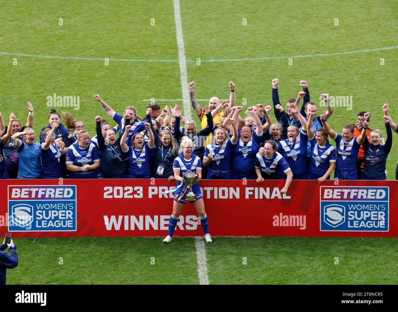 Barrow Raiders' Jodie Litherland and team celebrate winning promotion after the Betfred Women's Super League promotion final match at the LNER Community Stadium, York. Picture date: Sunday October 8, 2023. Stock Photo