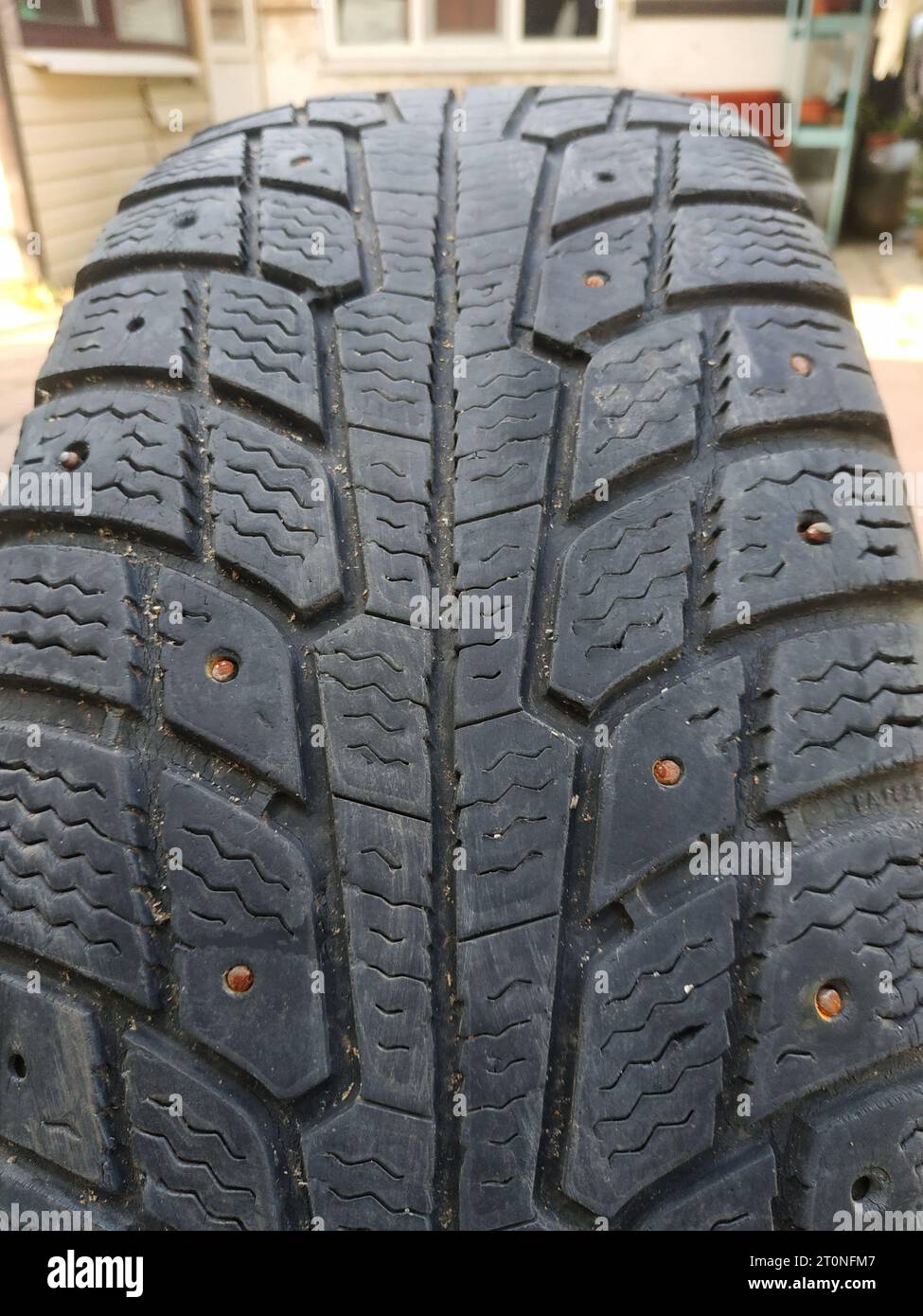 Wheel worn wear rubber tyre junkyard recycling heap hires stock