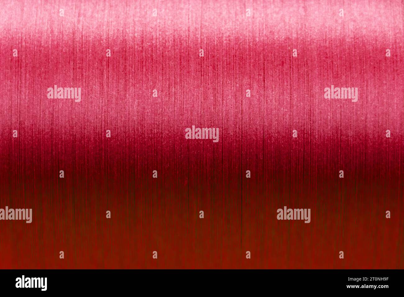Closed up of red color of thread textured background (Focus at center ...