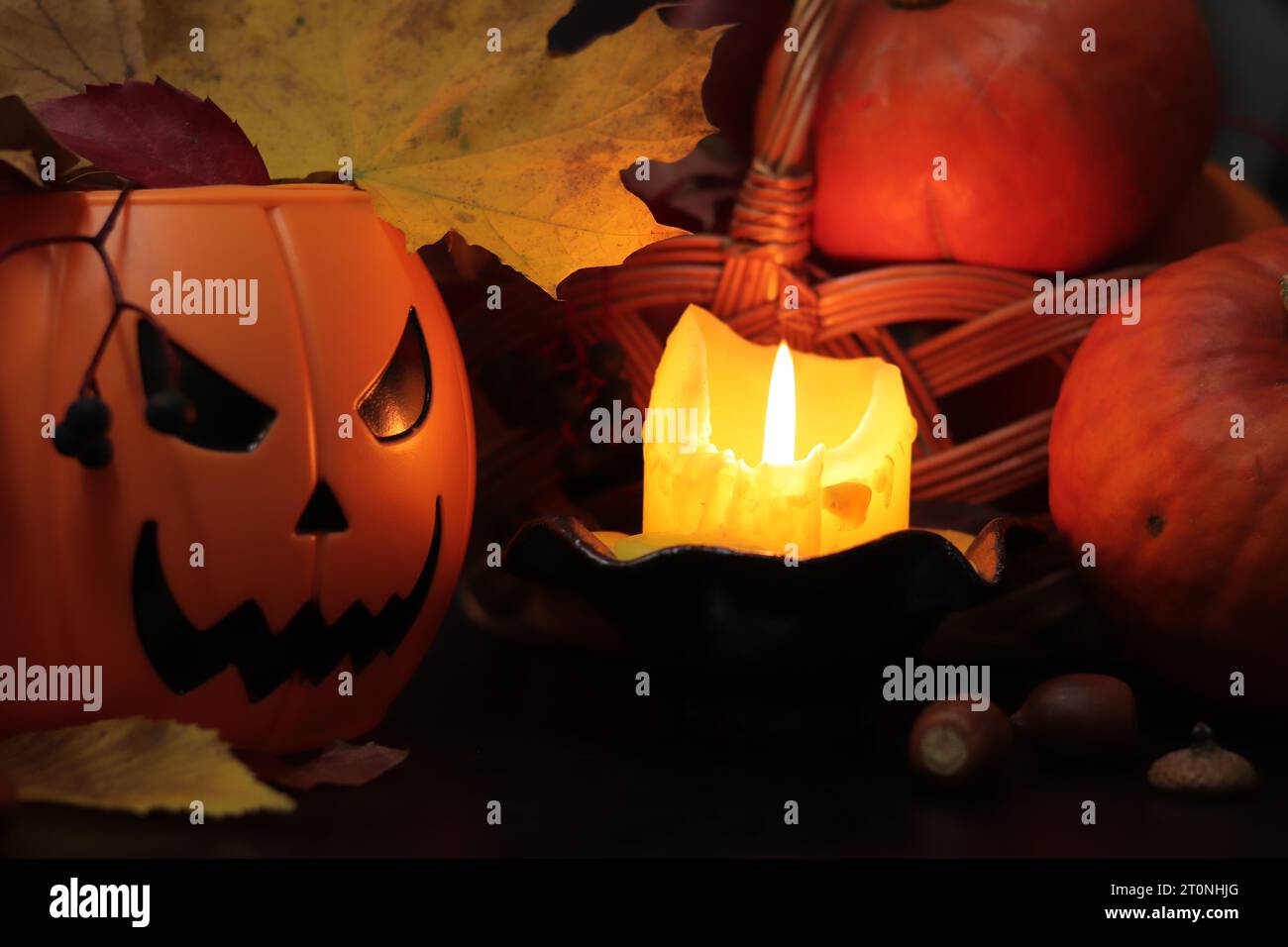 Evil Bucket Happy Halloween. A plastic pumpkin bucket with an evil smiling ...