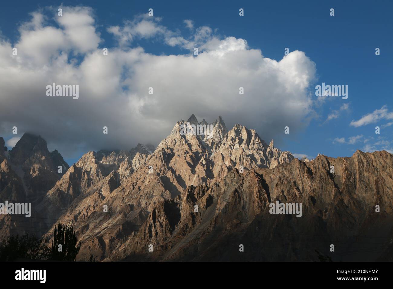 Lost in the grandeur of Passu's towering peaks. ?️✨ #PassuParadise #NatureWonders #PakistanBeauty' Stock Photo