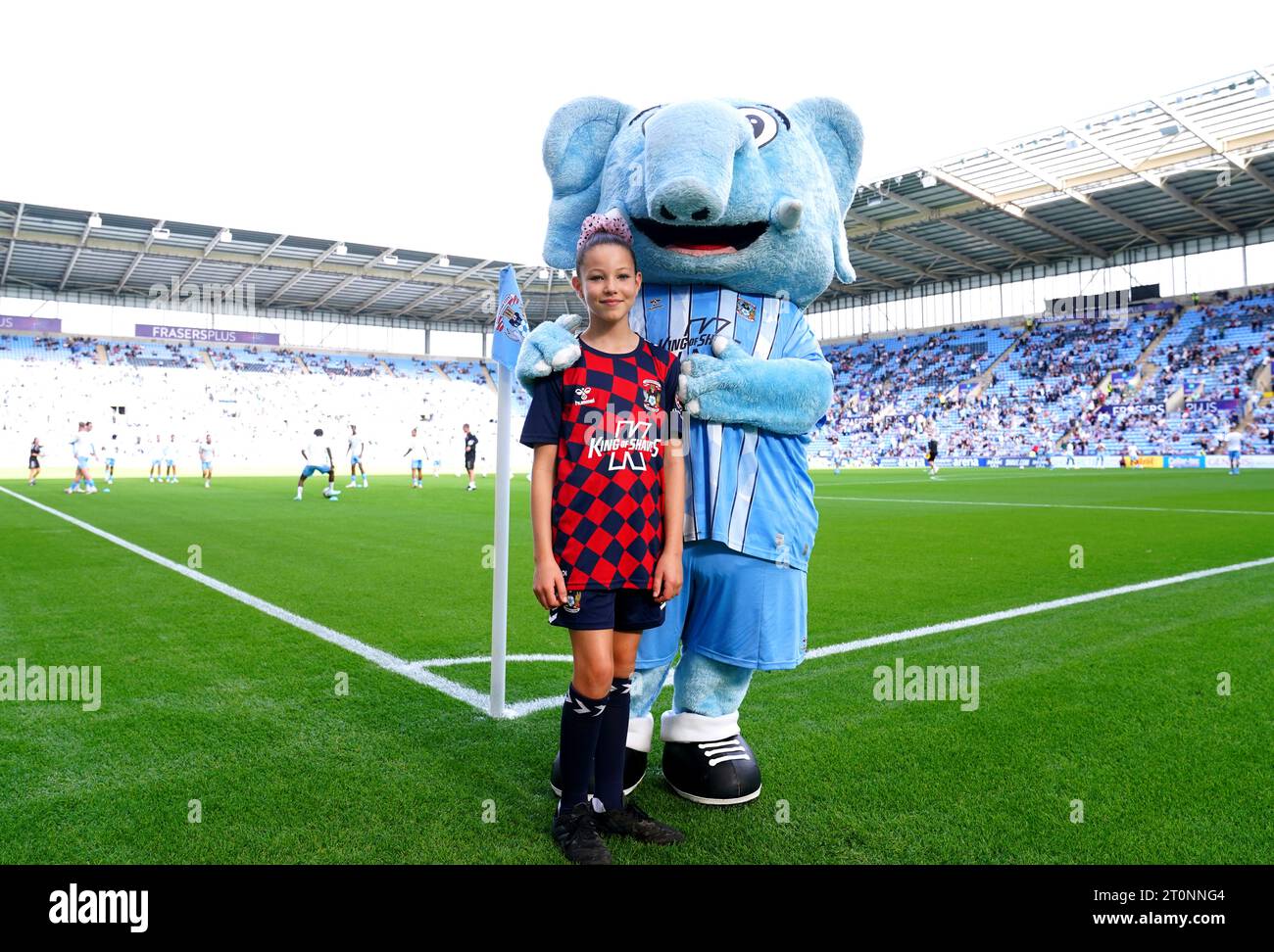 A Coventry City match day mascot poses for a photo with Sky Blue Sam ahead of the Sky Bet Championship match at the Coventry Building Society Arena, Coventry. Picture date: Saturday October 7, 2023. Stock Photo
