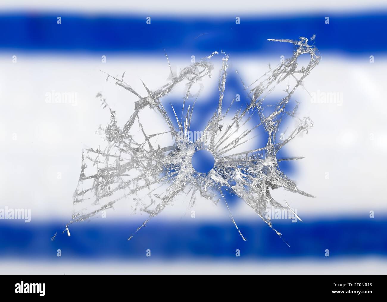 Bullet hole in dirty glass with Israel background Stock Photo