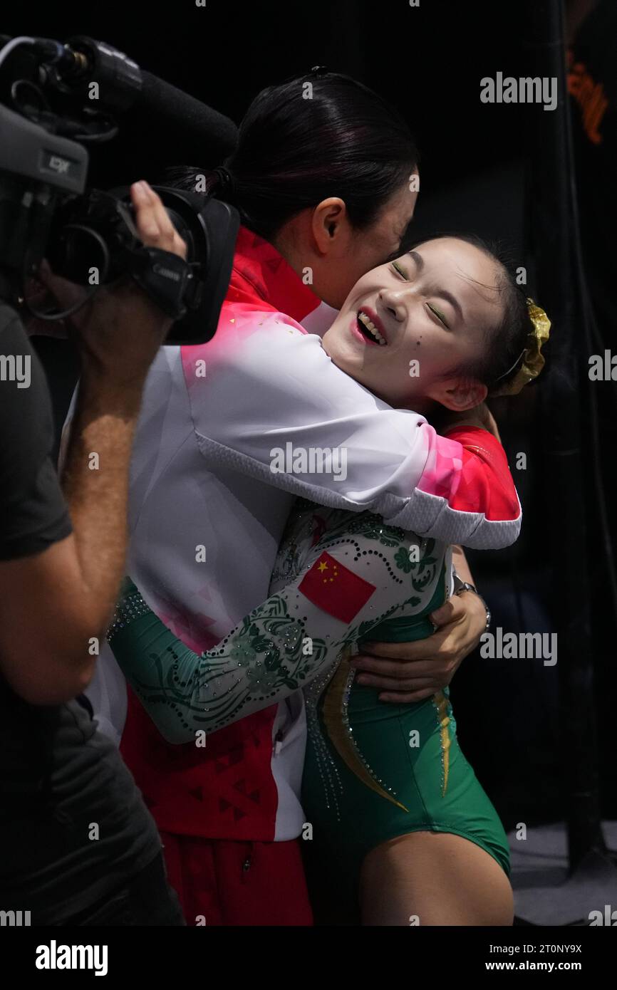 Antwerp, Belgium. 8th Oct, 2023. Zhou Yaqin of China hugs her coach