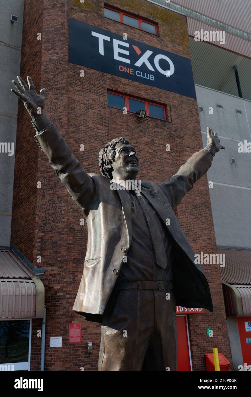 Statue of Sir Alex Ferguson, arms outstretched, outside Pittodrie, the home of Aberdeen Football Club, Scotland. Stock Photo