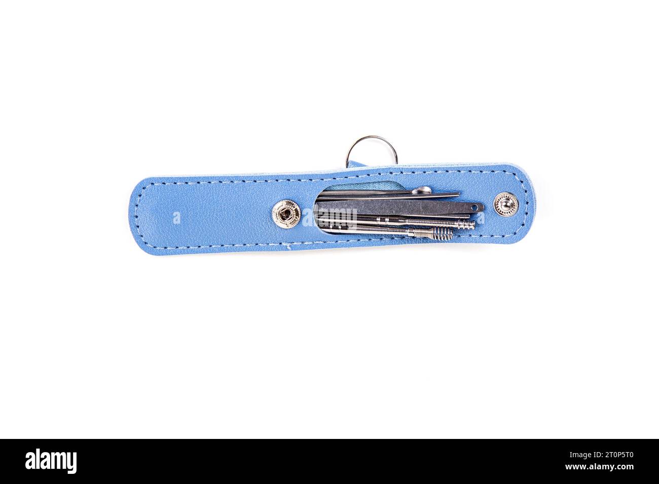 Small blue leather keychain kit with ear wax tools Stock Photo Alamy