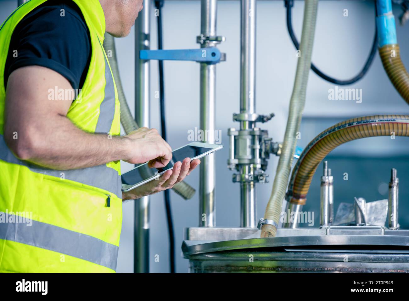 Technician engineer male worker working in boiler room gas pipe