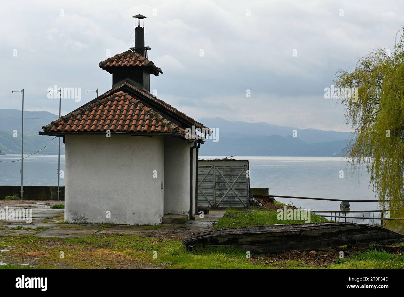 Serbia, Donji Milanovac, April 18, 2023: a tile-roofed building on the banks of the Danube.  Stock Photo