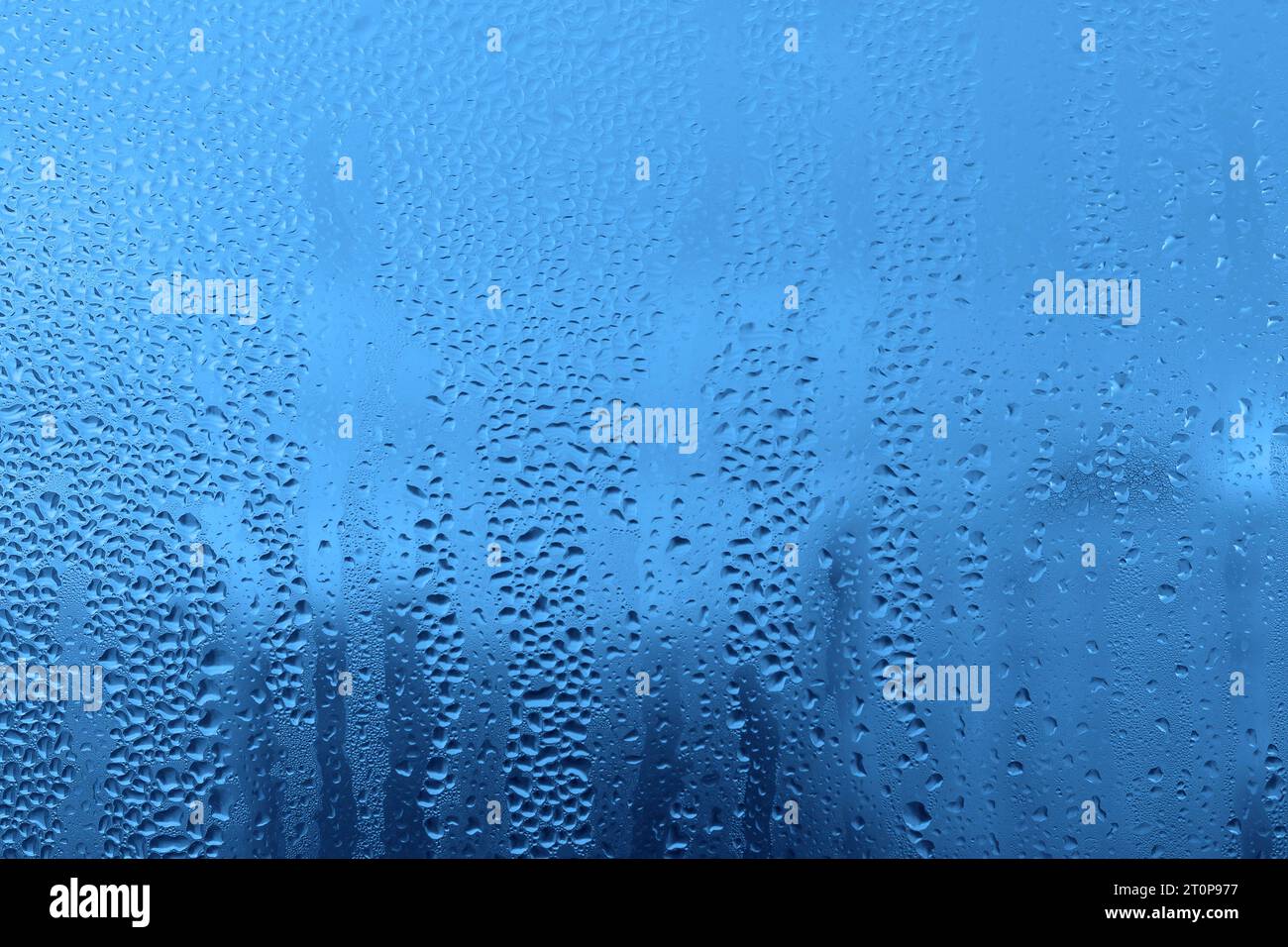Blue background with natural water drops on glass Stock Photo - Alamy