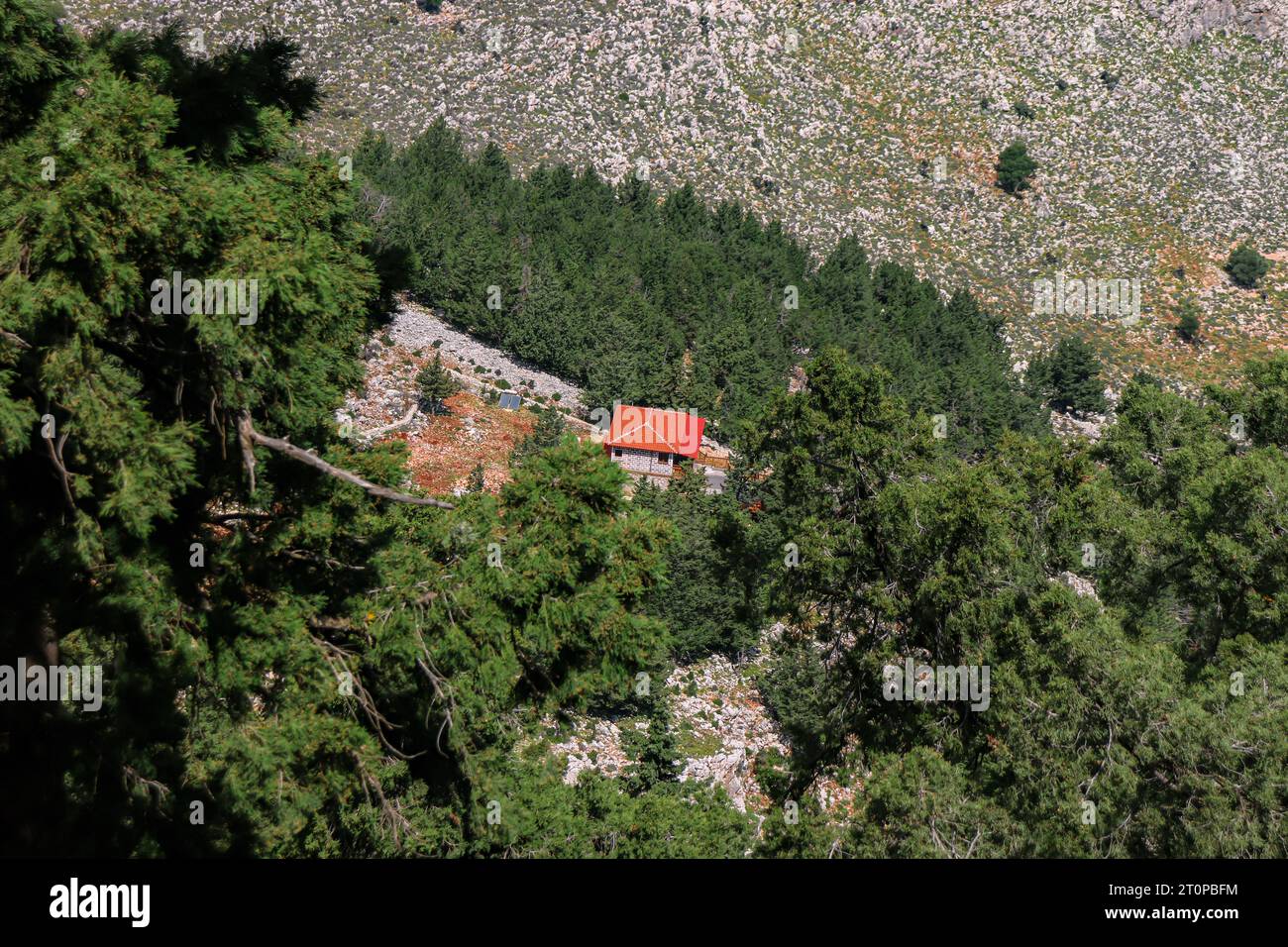 Single building with red Hip Roof view from the hike up to the Monastery Church of the Virgin Mary Tsambika (Kyra Psili) Stock Photo