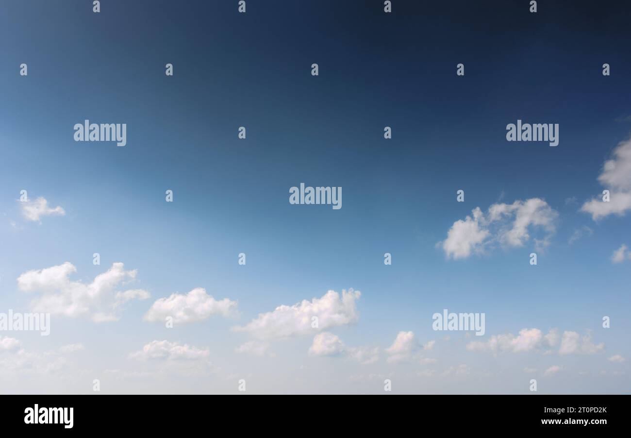 blue sky with fluffy clouds on a sunny day. beautiful nature background ...