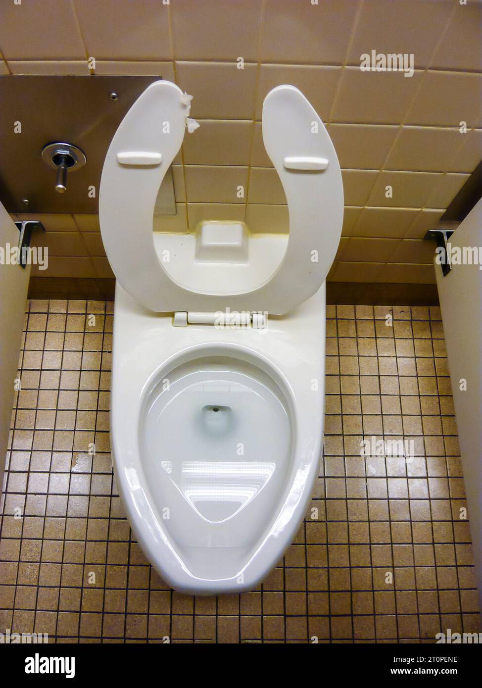 White western American style toilet with the toilet seat up Stock Photo