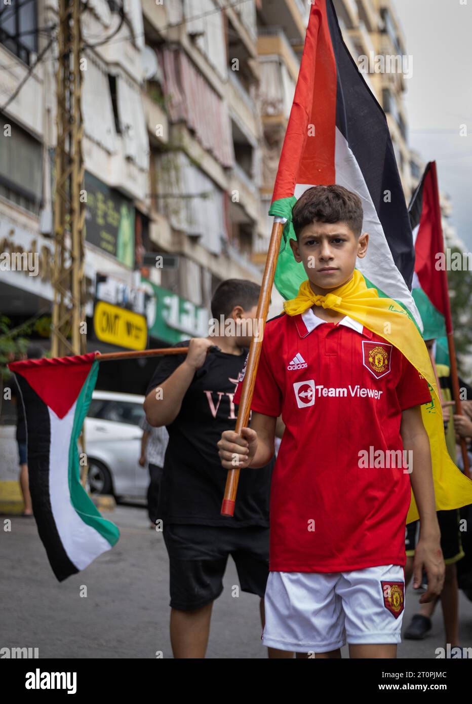 beirut-beirut-lebanon-8th-oct-2023-a-boy-wearing-a-hezbollah-flag