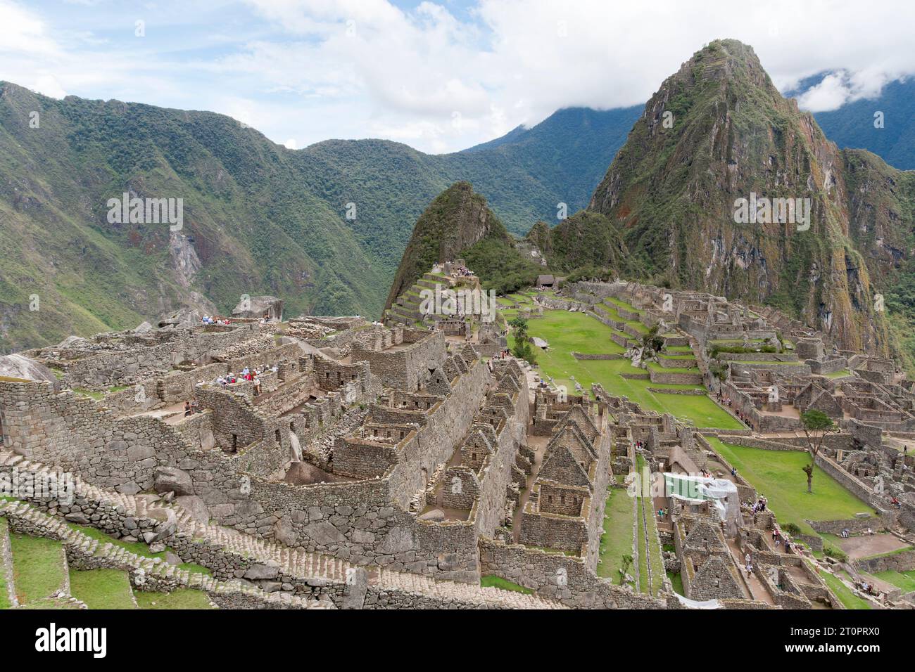 view of ruins of Machu Picchu in the Andes mountains of Peru Stock Photo