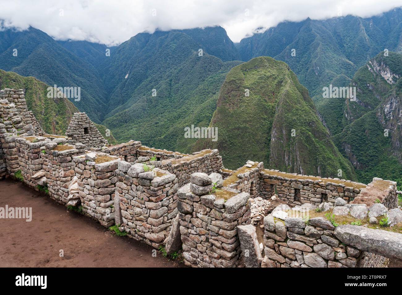 view of ruins of Machu Picchu in the Andes mountains of Peru Stock ...