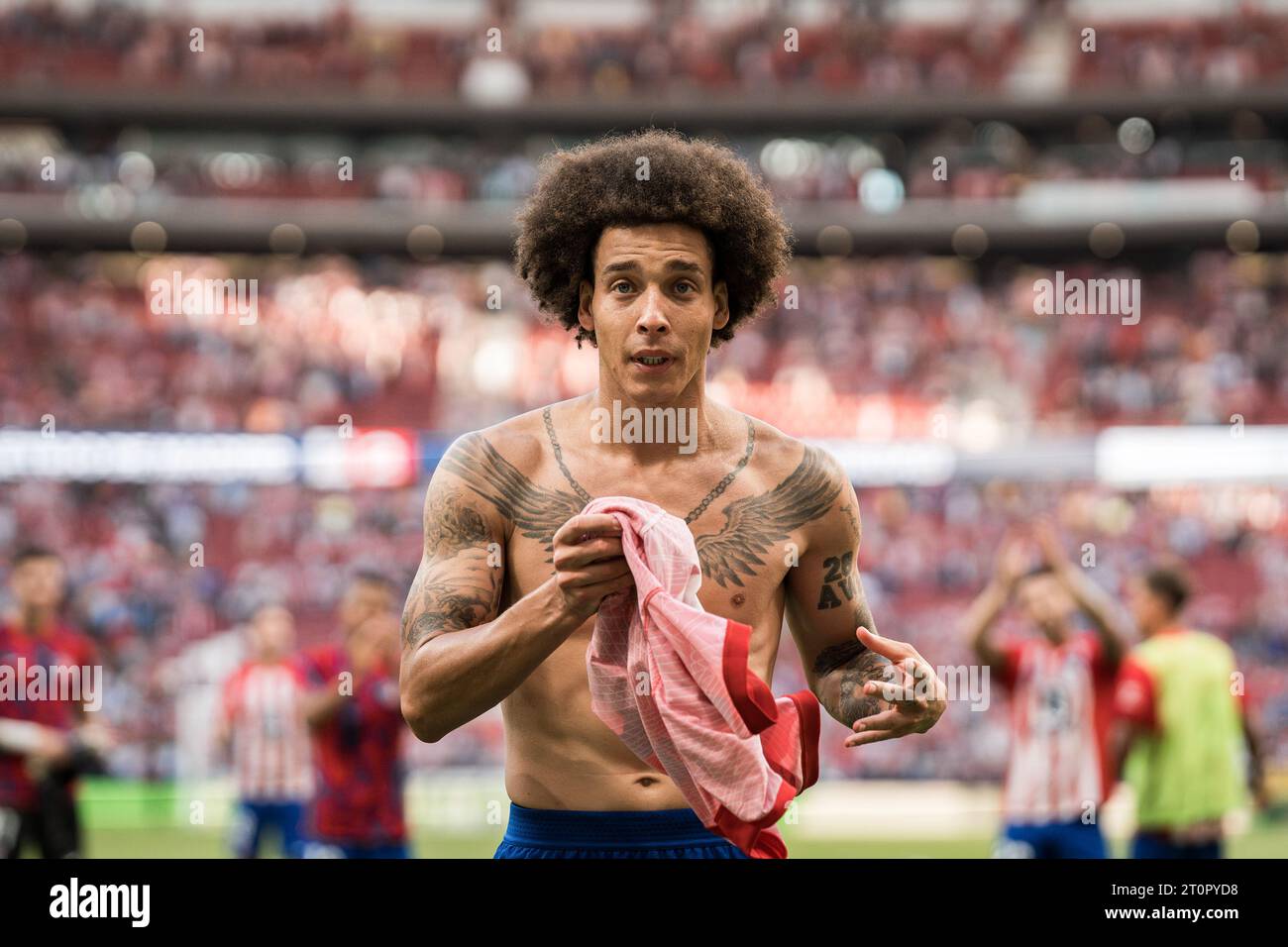 Madrid, Spain. 08th Oct, 2023. Axel Witsel (20) of Atletico Madrid gives away his jersey shirt during the LaLiga EA Sports match between Atletico Madrid and Real Sociedad at Civitas Metropolitano Stadium. Final score: Atletico de Madrid 2: 1 Real Sociedad. Credit: SOPA Images Limited/Alamy Live News Stock Photo
