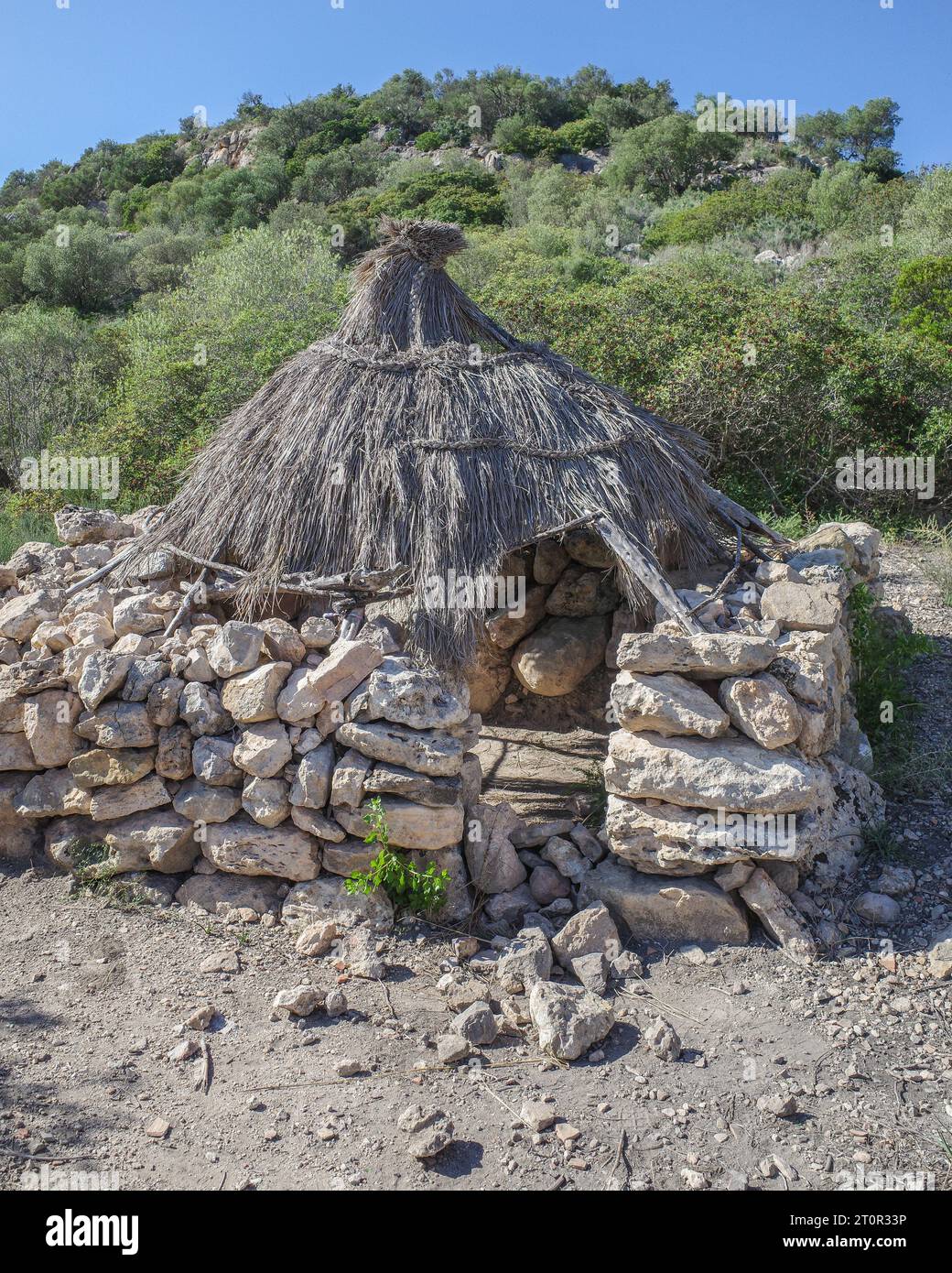 Mallorca, Spain - 8 Oct, 2023: Ancient charcoal huts at the Puig de sa Marisca archaeological site Stock Photo
