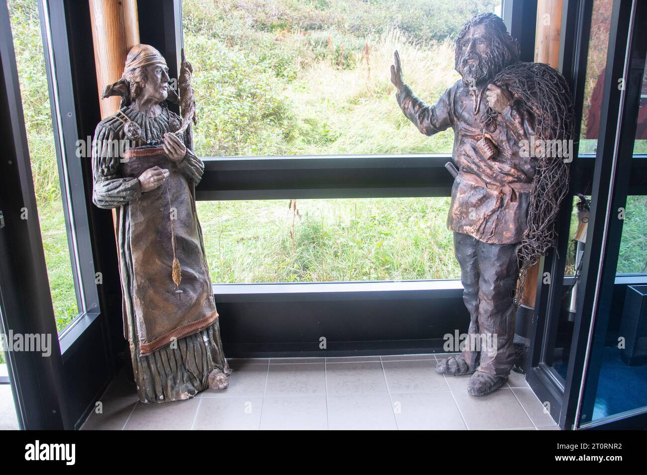 Statue of two Vikings inside the visitors centre at L’Anse aux Meadows in Newfoundland & Labrador, Canada Stock Photo