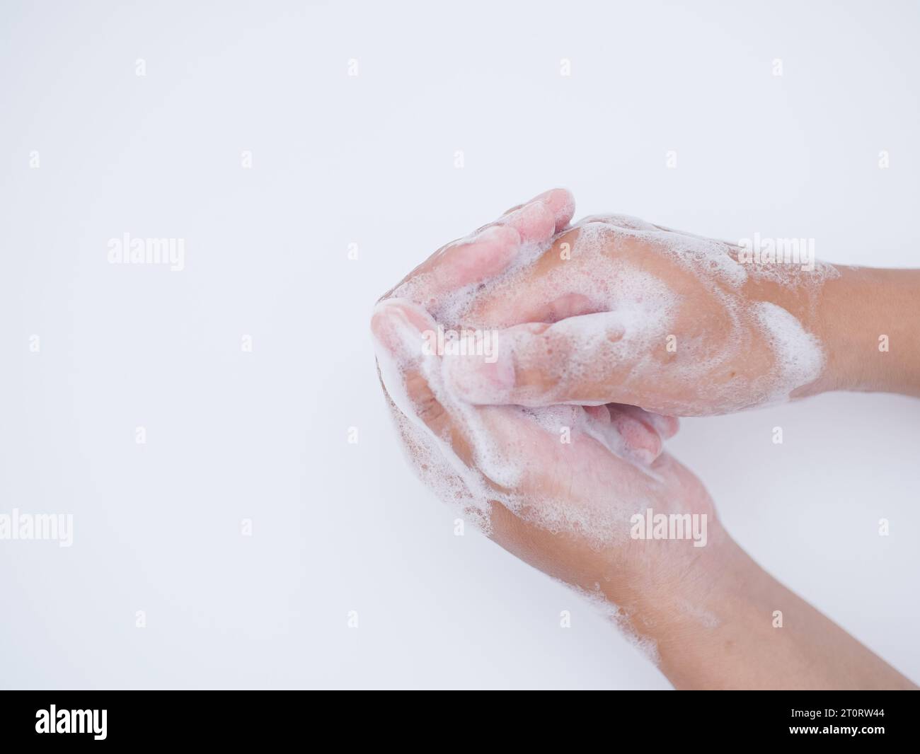 hand washing with foam of soap isolated on white background Stock Photo