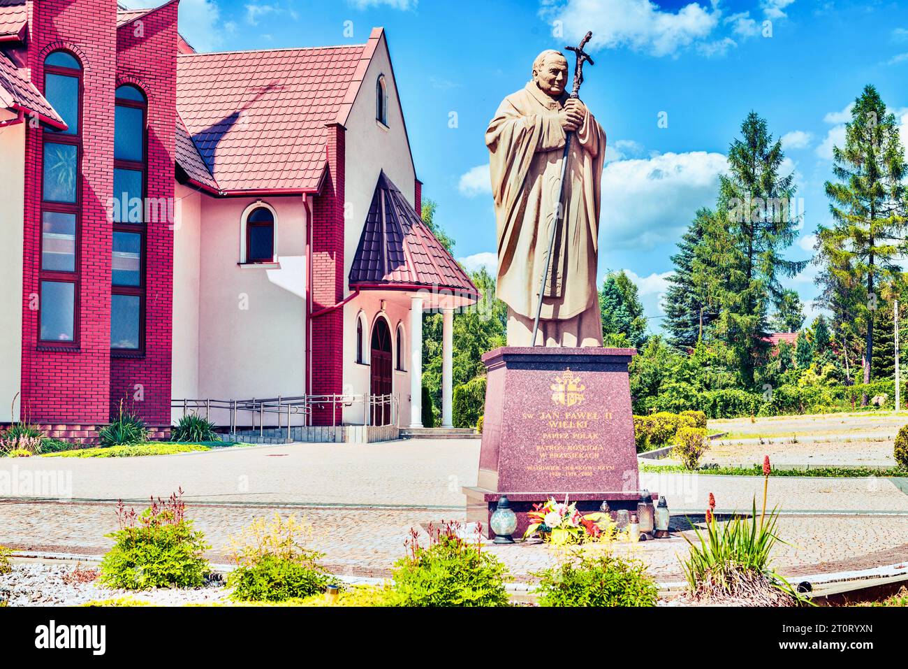 View of the monument to John Paul II and the beautiful Catholic chapel in the village of Przysieki, Subcarpathian Voivodeship. Stock Photo