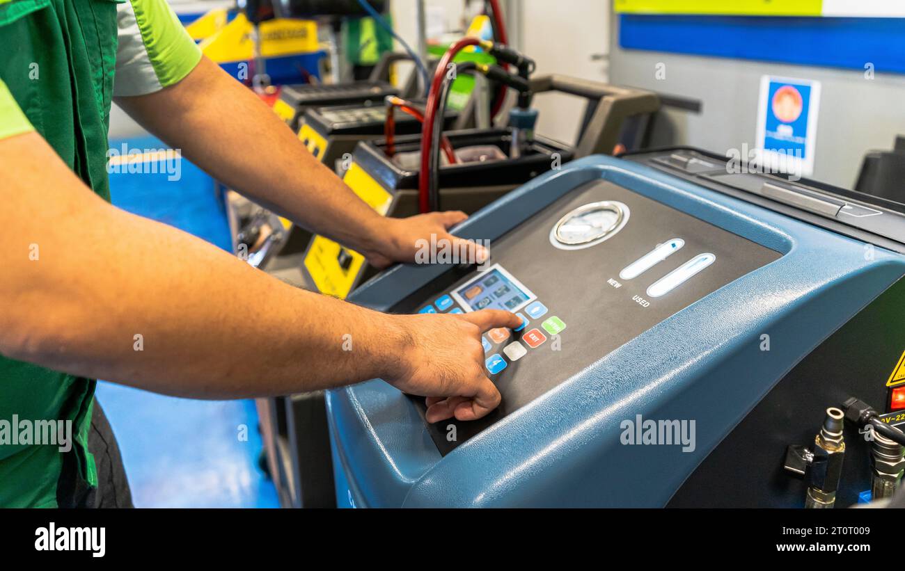 Close up view of a Maintenance Car service - auto oil change, motor