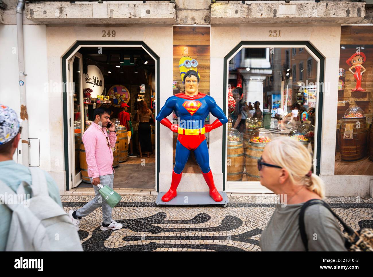 Rua Augusta, Lisbon Portugal, a Superman mannequin at the entrance to Candy Lisa, a Italian retail sweets shop, on Rua Augusta in central Lisbon.  The Italian retailer, with 37 shops in Italy and Europe, marks its brand image with extravagant iconic cartoons and superheroes. Stock Photo