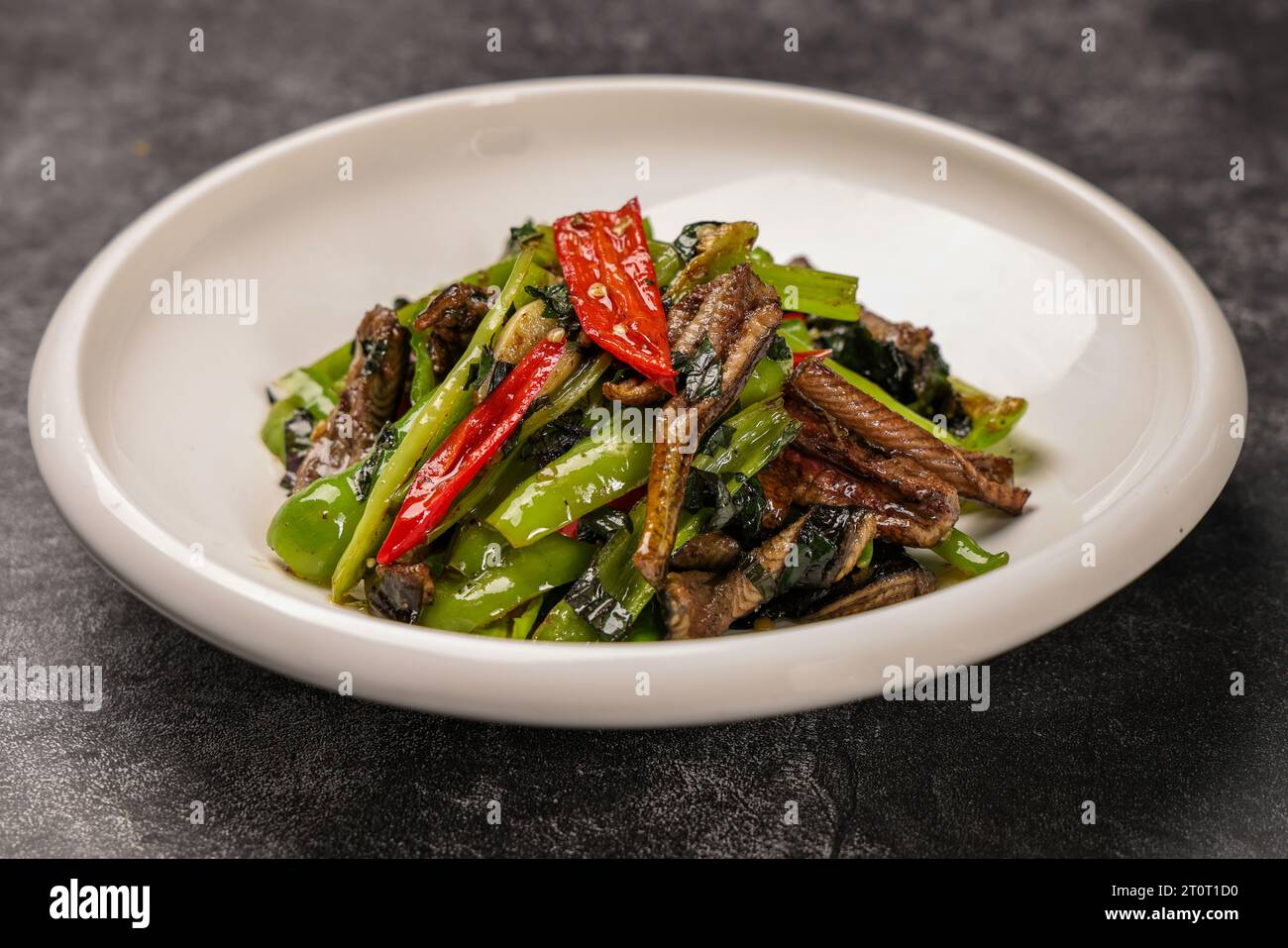 Stir Fried (Sautéed) Shredded Eel with Hangzhou Green Chili Stock Photo