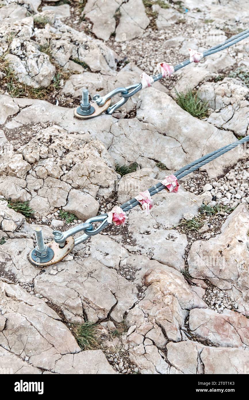 Fastening of suspension bridge braces into rock with large metal