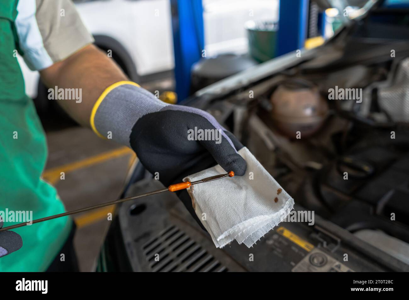 Close up view of a Maintenance Car service - auto oil change, motor check, brake cleaning, tire check, engine inspection, motor oil-brake inspection Stock Photo