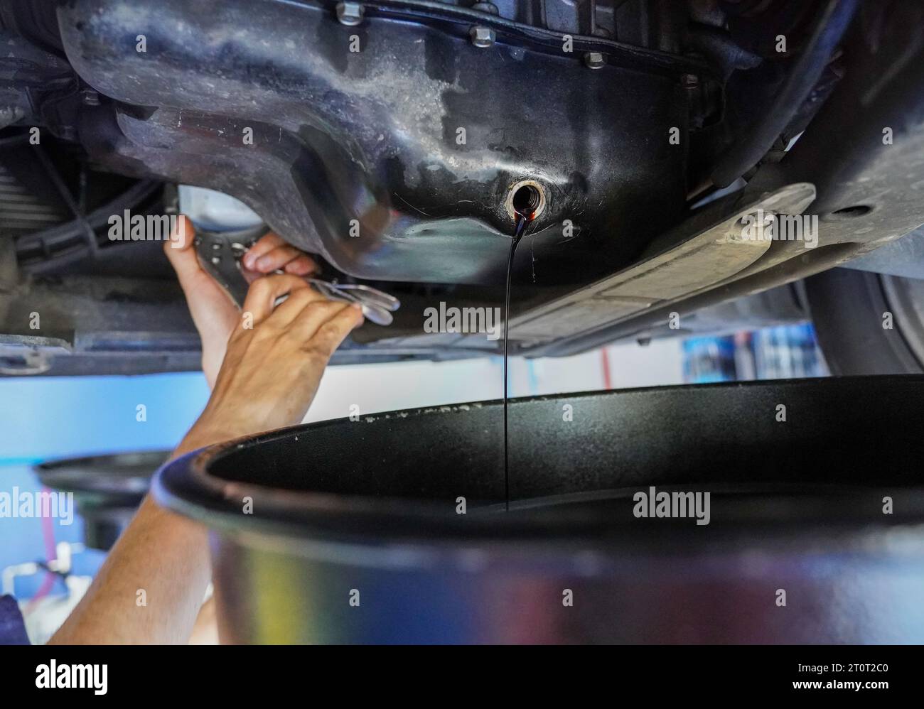 Close up view of a Maintenance Car service - auto oil change, motor check, brake cleaning, tire check, engine inspection, motor oil-brake inspection Stock Photo