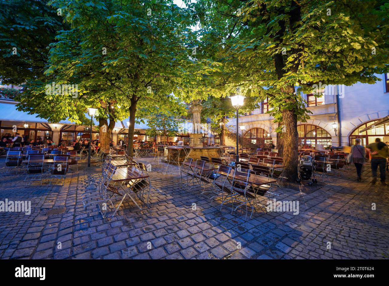 Munich, Germany, EU - Sept. 18, 2023. Hofbräuhaus München outdoor beer garden courtyard during Oktoberfest. Hofbrauhaus  Munich, a historic beer hall. Stock Photo