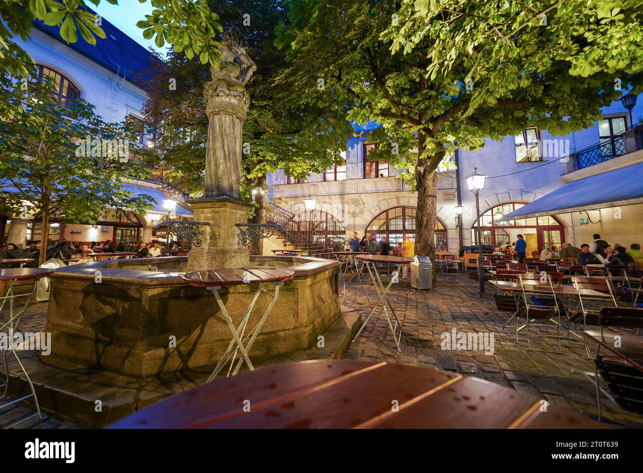 Munich, Germany, EU - Sept. 18, 2023. Hofbräuhaus München outdoor beer garden during Oktoberfest. Hofbrauhaus, a historic and famous Munich beer hall. Stock Photo